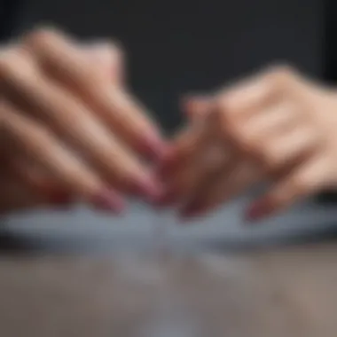 Person applying non-chemical nail polish with a focus on the brush technique.