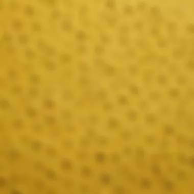 Close-up of yellow polka dot swimsuit fabric texture