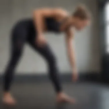 Athlete demonstrating the flexibility of Lululemon Wunder Under tights during a workout