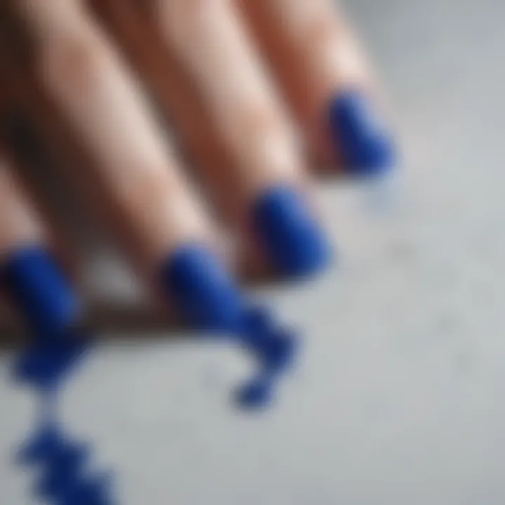 Artistic representation of OPI Royal Blue nail polish dripping onto a canvas