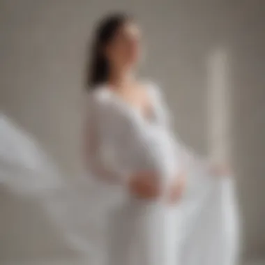 Pregnant woman in a flowing white dress