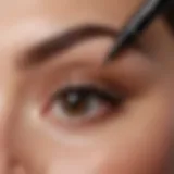 Close-up view of a semi-permanent eyebrow tattoo pen showcasing its unique tip and formulation.