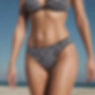 Sleek Monochrome Bikini Bottom Sleek high-waisted bikini bottom in striking monochrome pattern