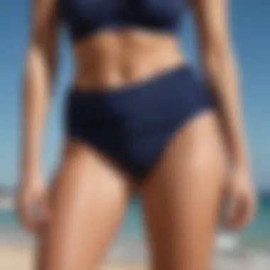 Elegant ruched high-waisted bikini bottom in deep navy