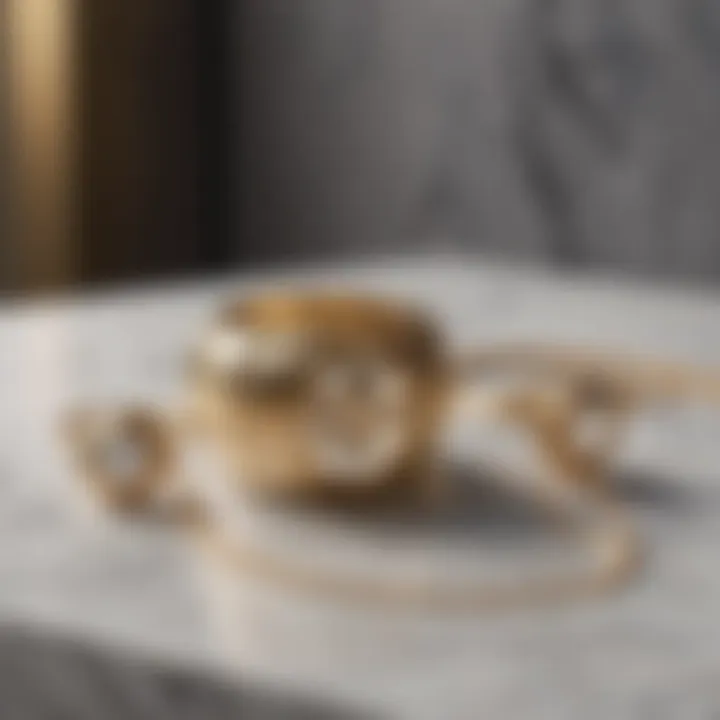 Minimalist gold jewelry set on marble background