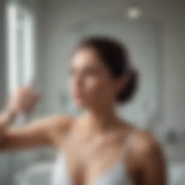 Applying Detangler Spray A person applying detangler spray onto their hair in a bright bathroom