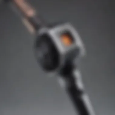 Close-up of adjustable heat settings on a curling iron