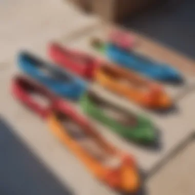 A collection of colorful suede shoes arranged on a sunny patio.