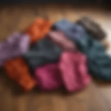 An array of stylish yoga pants displayed on a wooden floor