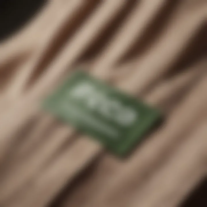 Close-up of eco-friendly fabric tags on stylish clothes, emphasizing sustainability.
