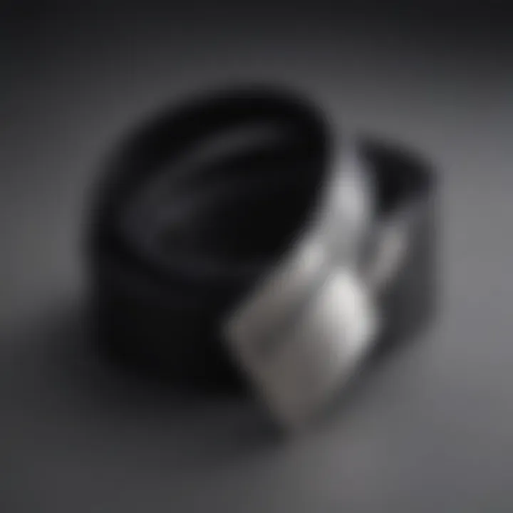 Minimalist black belt with a sleek silver buckle