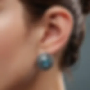 Close-up of titanium post earrings showcasing their hypoallergenic properties