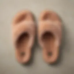 Close-up of UGG fuzzy flip flop slippers showcasing plush material