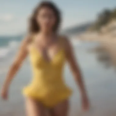 Woman in yellow polka dot bathing suit walking along the beach